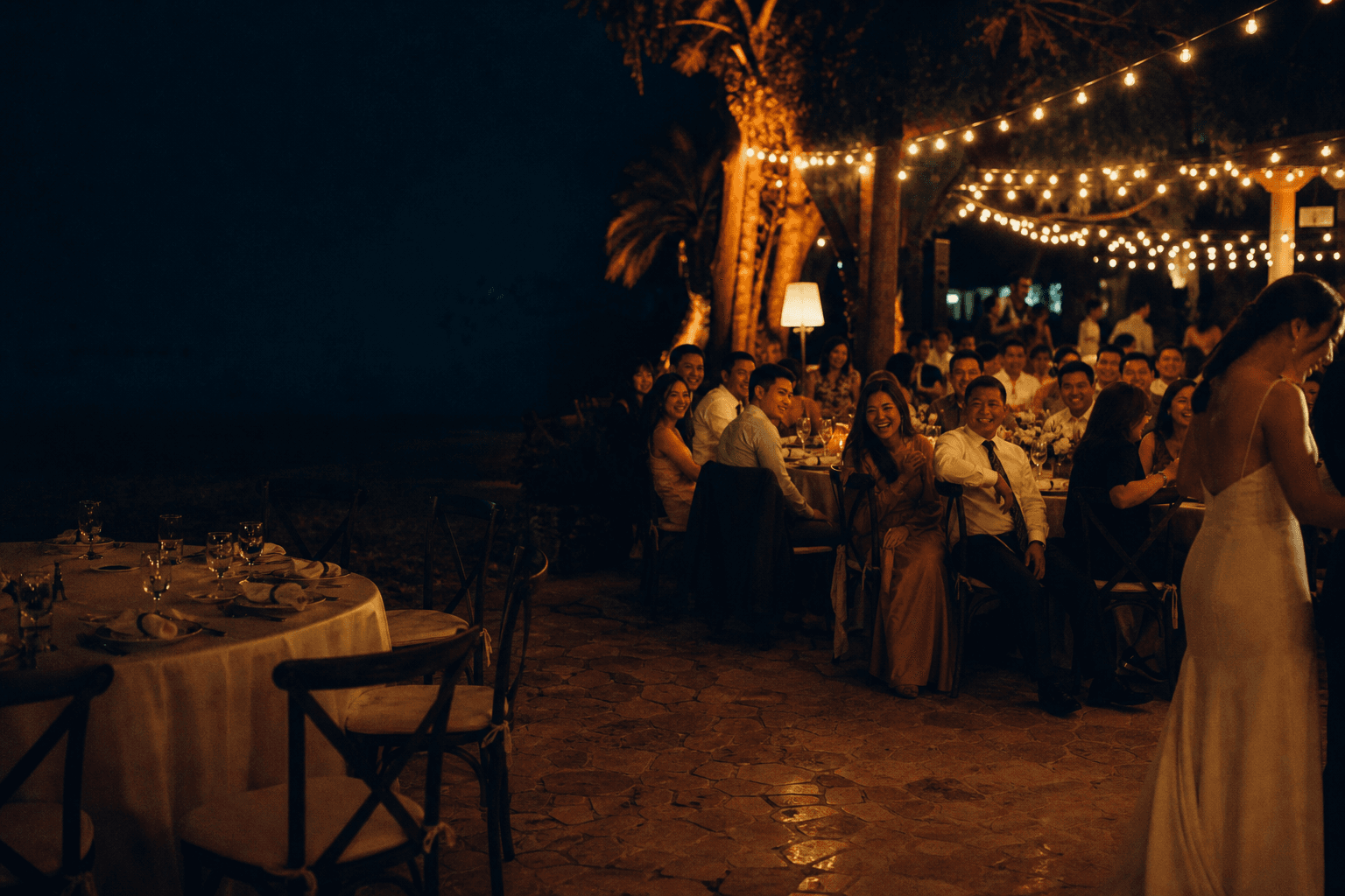 Guests taking candid photos at a Filipino celebration